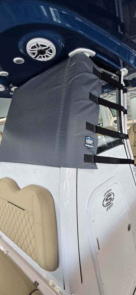 Marine RoadGuard windshield shield and attachment straps installed on a boat