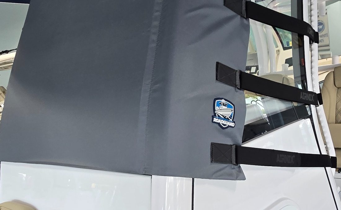 Marine RoadGuard gray windshield cover fitted to white Sportsman Open 232